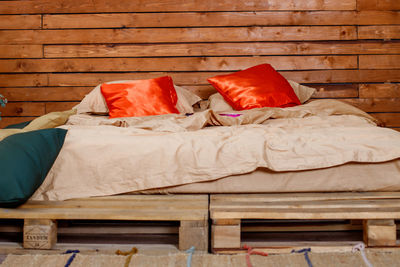 High angle view of clothes on bed against wall