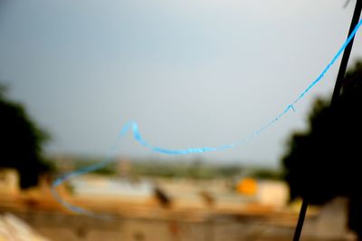 Close-up of blurred background against clear sky