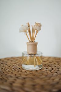 Close-up of glass vase on table