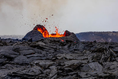 Rock formation on land against sky