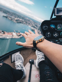 Low angle view of man and airplane at camera