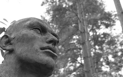 Low angle view of statue against sky