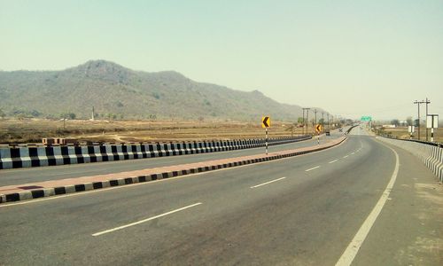 Road leading towards mountains