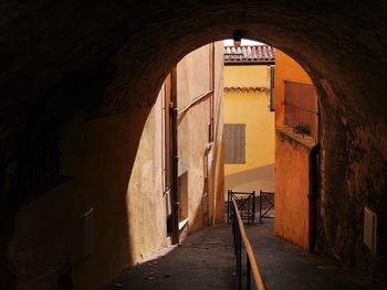 Narrow alley in tunnel