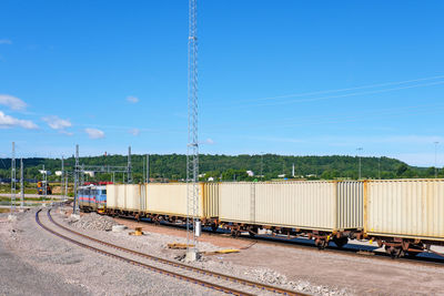 Train with containers on wagons