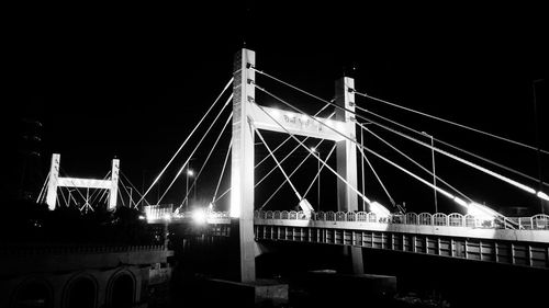 View of suspension bridge at night