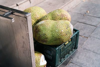 Durian for sale on the side of the street