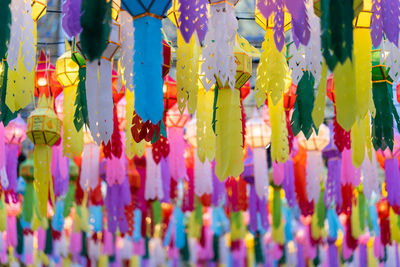 Full frame shot of multi colored flowers hanging for sale