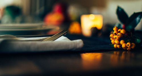 Fork and napkin on table at restaurant