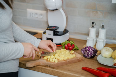 Midsection of woman holding food