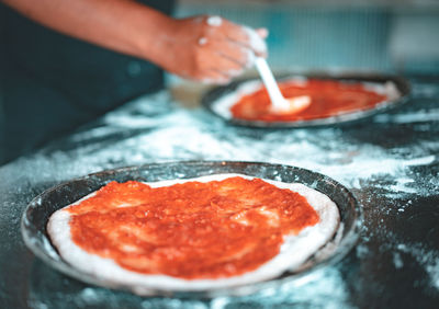 Close-up of person preparing food