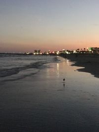 Scenic view of sea against sky at sunset