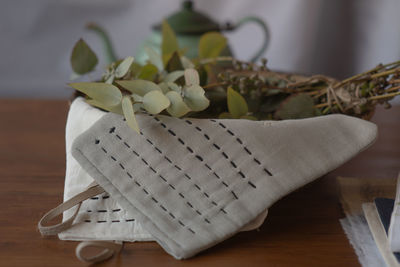 Close-up of white paper on table at home