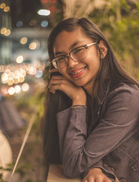 Portrait of smiling young woman