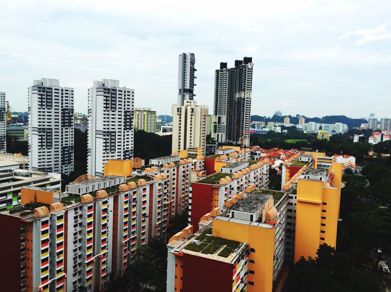 building exterior, city, architecture, skyscraper, built structure, tall - high, tower, modern, cityscape, office building, sky, development, urban skyline, tall, city life, building, residential building, crowded, cloud - sky, financial district