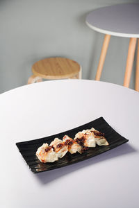 Close-up of food in plate on table