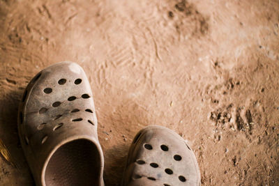 High angle view of shoes on ground