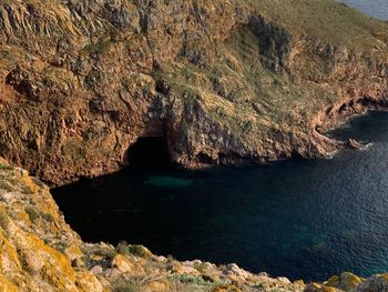 High angle view of rocks in sea