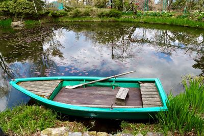 Boat moored in lake