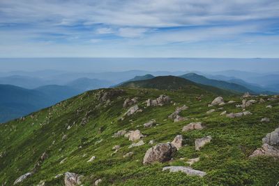 Scenic view of rocky mountains against sky