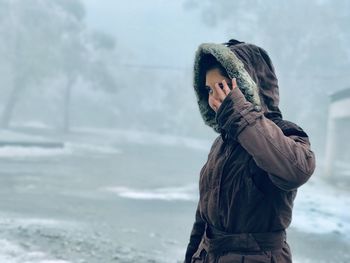 Man looking at camera during winter