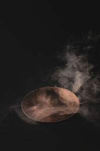 Close-up of smoke against black background