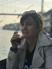 Close-up of woman drinking tea