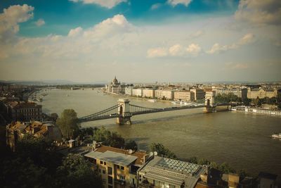 High angle view of chain bridge over danube river against cloudy sky