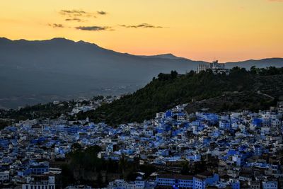 High angle view of townscape against sky during sunset