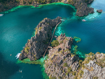 High angle view of rocks on sea