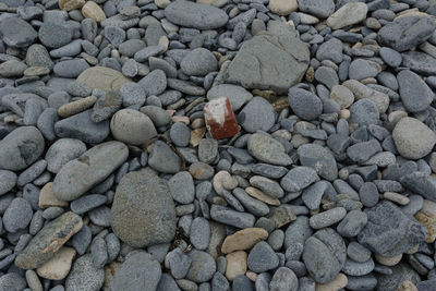 High angle view of stones on pebbles