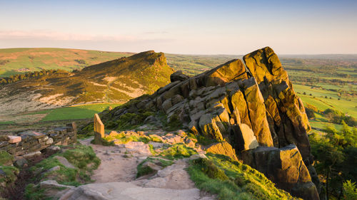 Scenic view of rock formations against sky