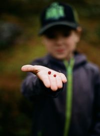 Boy holding seeds