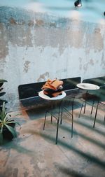 Man sitting on table at home