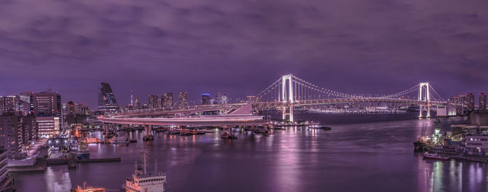 Circular highway leading to the rainbow bridge in odaiba bay of tokyo.