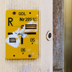 Close-up of yellow street signing 