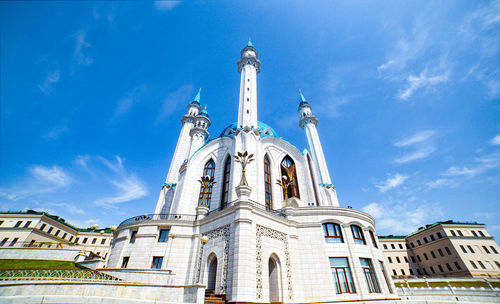 Low angle view of building against blue sky