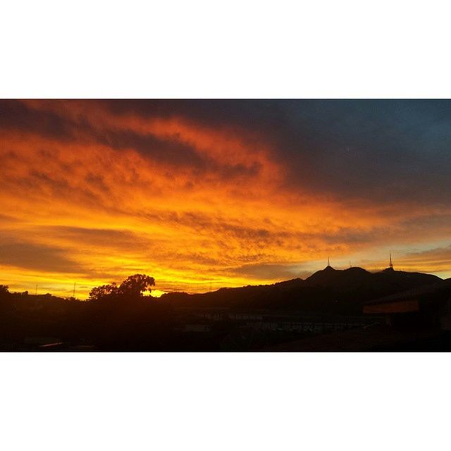 transfer print, sunset, auto post production filter, sky, silhouette, scenics, orange color, beauty in nature, cloud - sky, tranquil scene, tranquility, nature, cloud, dramatic sky, idyllic, dusk, outdoors, no people, cloudy, mountain