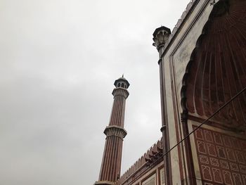 Low angle view of statue against sky