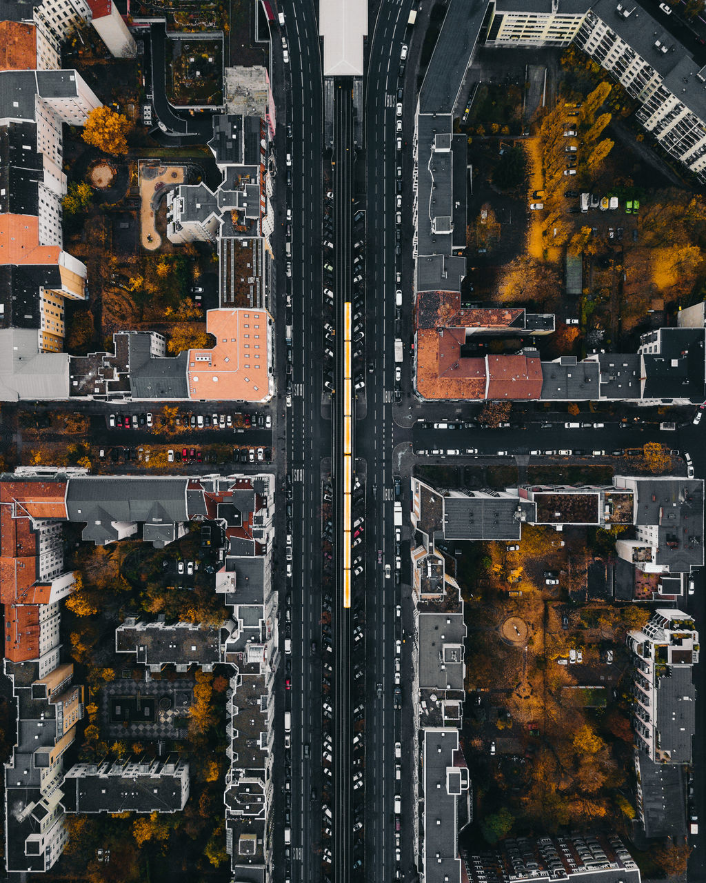 city, no people, architecture, building exterior, built structure, transportation, aerial view, cityscape, directly above, connection, illuminated, modern, building, motor vehicle, high angle view, mode of transportation, outdoors, street, car