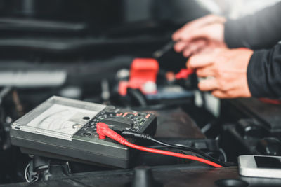 Close-up of man working on table