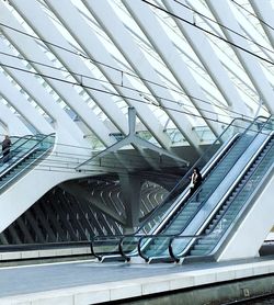 Low angle view of woman walking on staircase