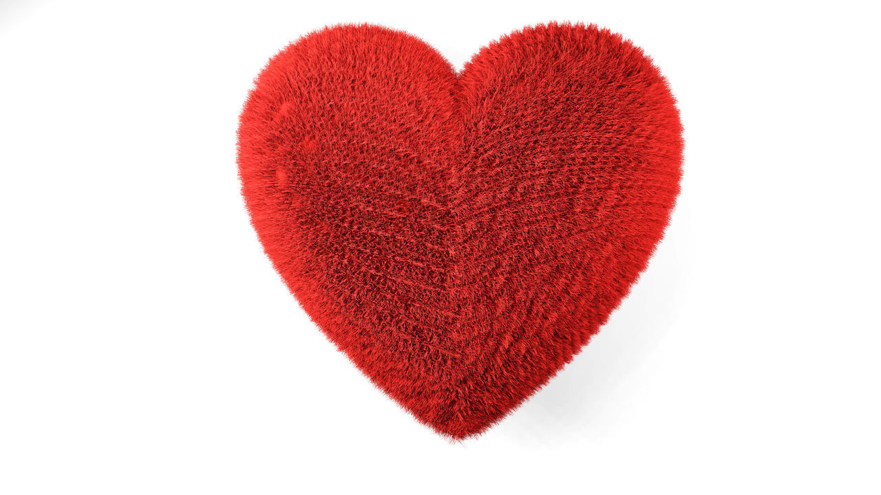 CLOSE-UP OF HEART SHAPE AGAINST WHITE BACKGROUND