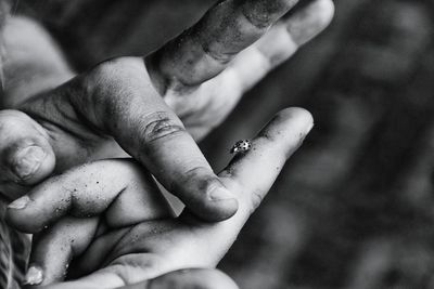 Cropped image of woman holding hands