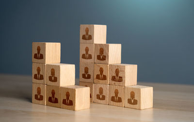 Close-up of toy blocks on table against gray background