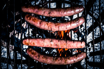 High angle view of meat on barbecue grill