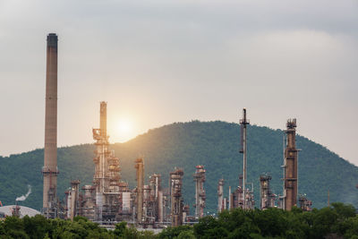 Panoramic view of factory against sky