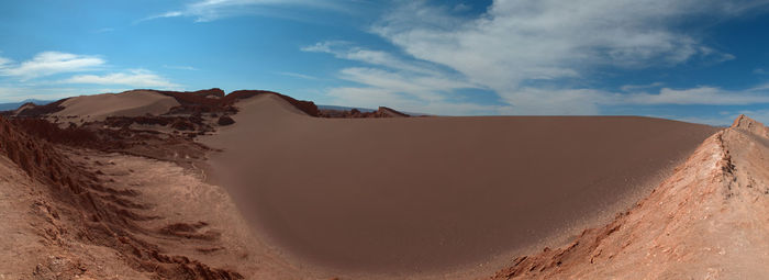 Panoramic view of desert against sky