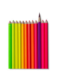 Close-up of colored pencils against white background