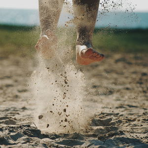 Man jumping on beach